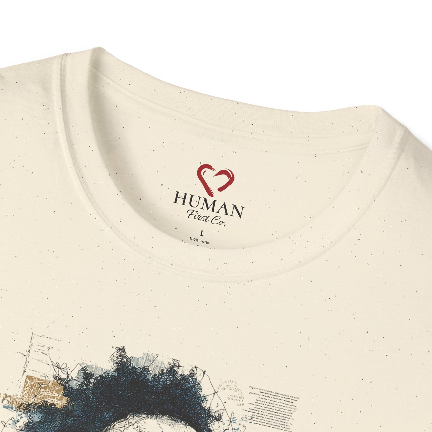 Close-up collar view of Human First Co. humanitarian t-shirt showing branded neck label and garment details.
