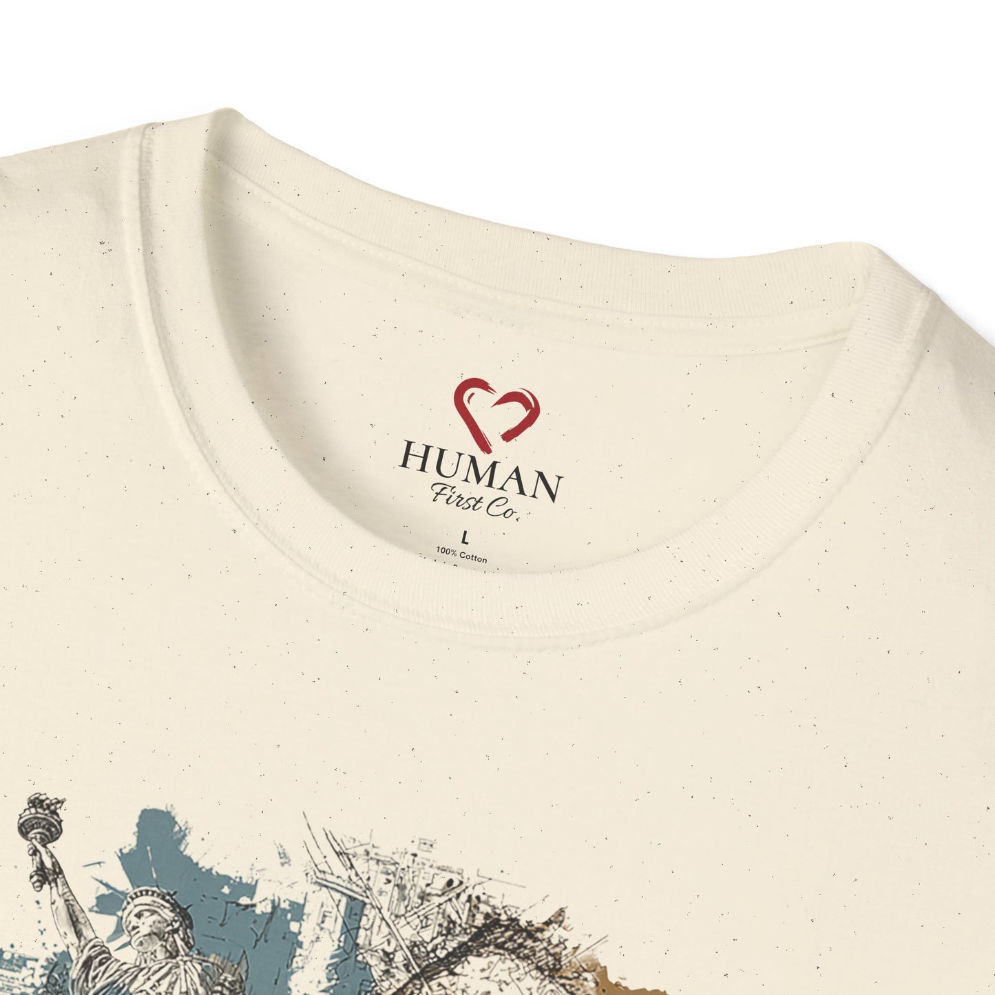 Close-up collar view of Human First Co. humanitarian t-shirt showing branded neck label and garment details.